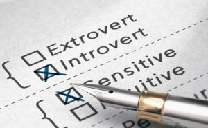Personality test with the words "Introvert" and "Sensitive" marked with a pen