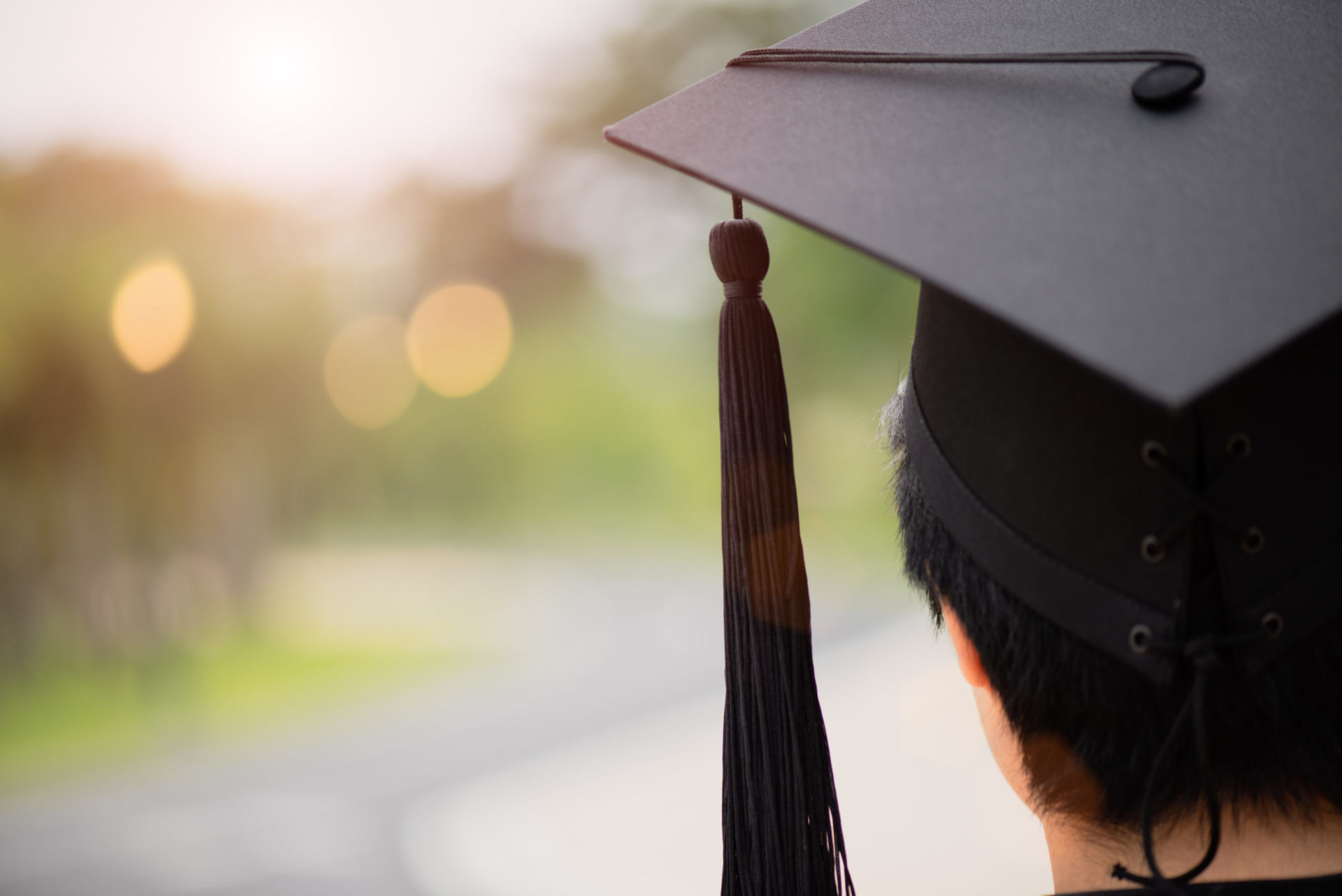Male graduate wearing his cap