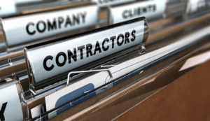 File labeled contractors with documents inside