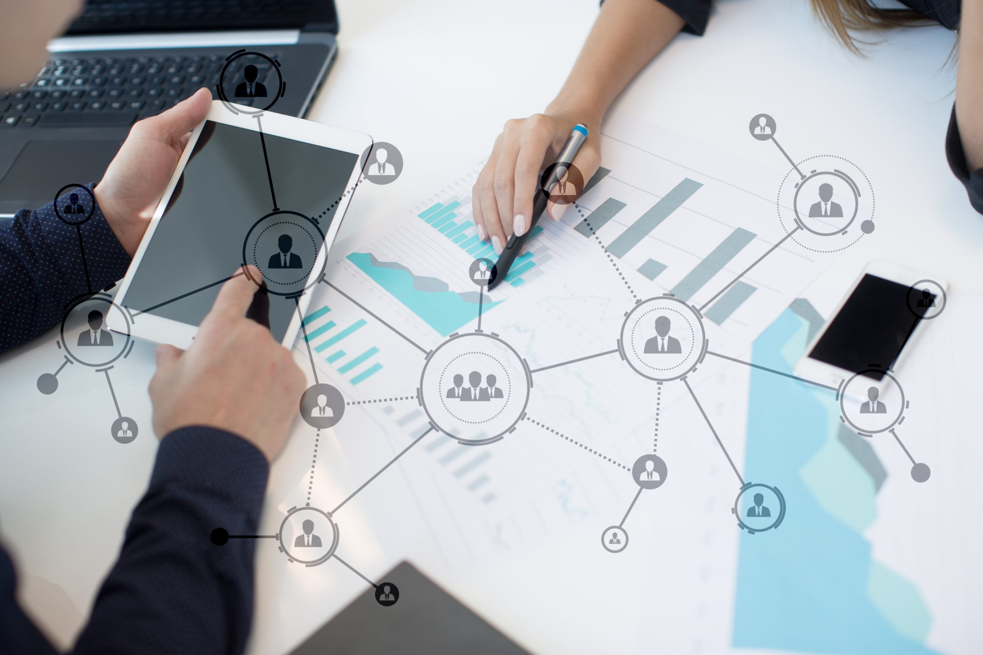 Human resources manager pointing at data and graphics