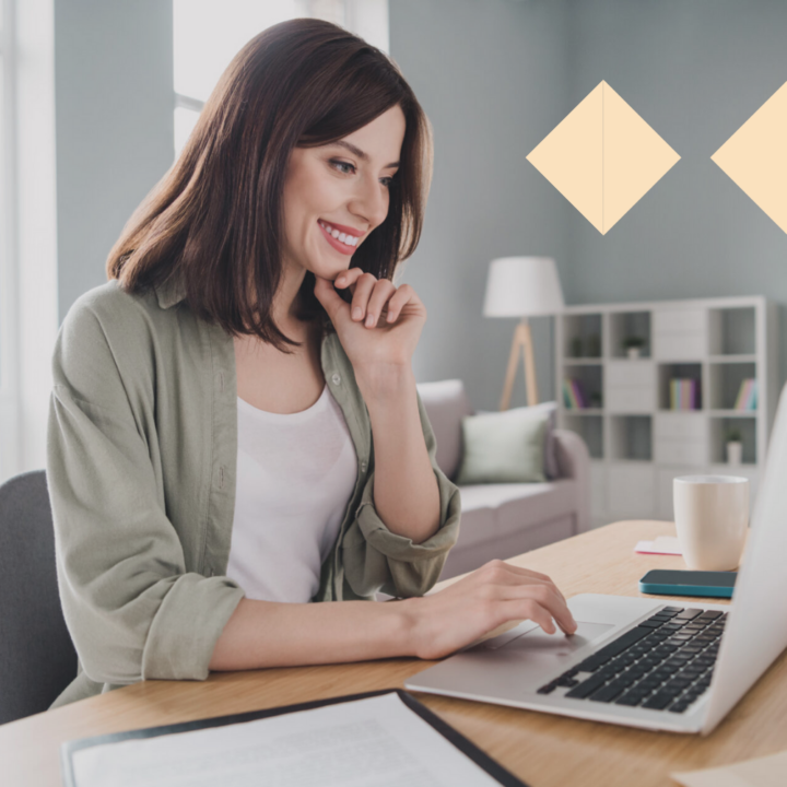 Female RPO provider at her desk in home office on her laptop typing