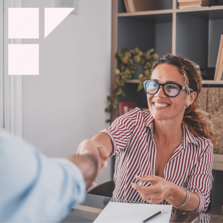Human resources manager conducting job interview with applicants in office assessing their soft skills