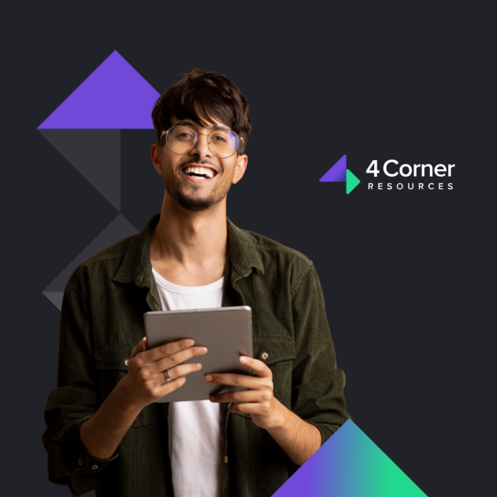 Man wearing glasses holding a tablet smiling next to 4 corner resources logo