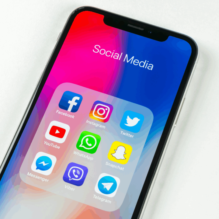Smartphone screen displaying a folder labeled “Social Media” with popular app icons including Facebook, Instagram, Twitter, YouTube, WhatsApp, Snapchat, Messenger, Viber, and Telegram, representing digital communication and recruitment platforms.