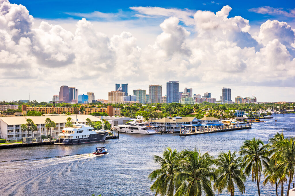 “Vibrant Fort Lauderdale skyline overlooking the waterways and marinas, showcasing the city’s mix of tropical charm and modern high-rises.