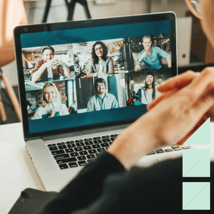 Woman has video conference with her remote team she built using laptop and camera