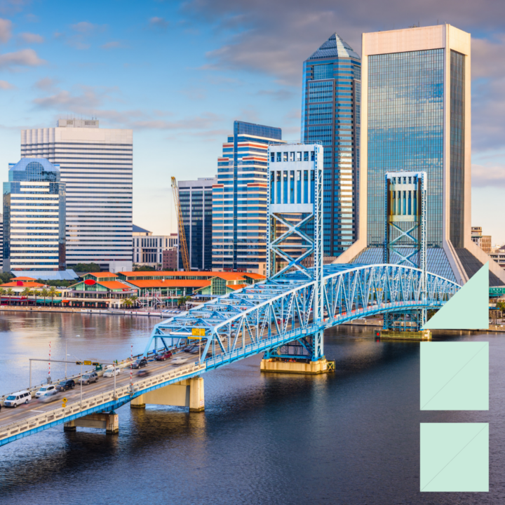 Jacksonville, Florida skyline with the Main Street Bridge over the St. Johns River, representing the city’s growing business and hiring market.