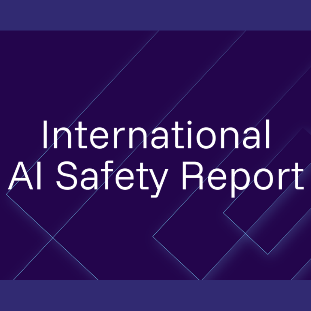 Graphic with a purple background displaying the text “International AI Safety Report,” representing a report or publication on global artificial intelligence safety.