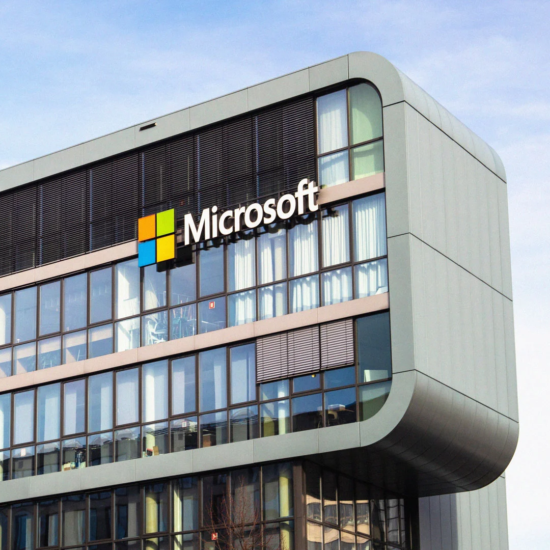 Microsoft office building exterior featuring the Microsoft logo and four-color Windows emblem